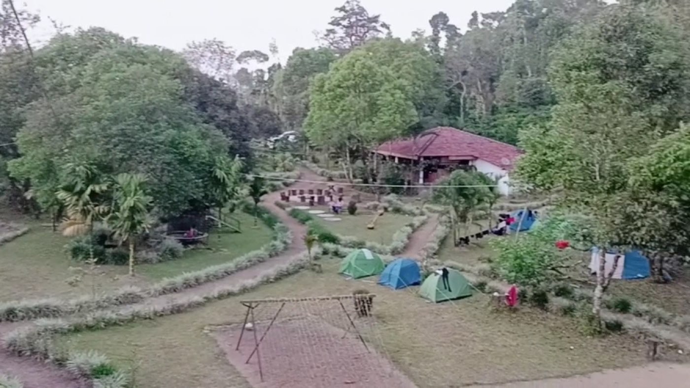Lawns with tents and cottages