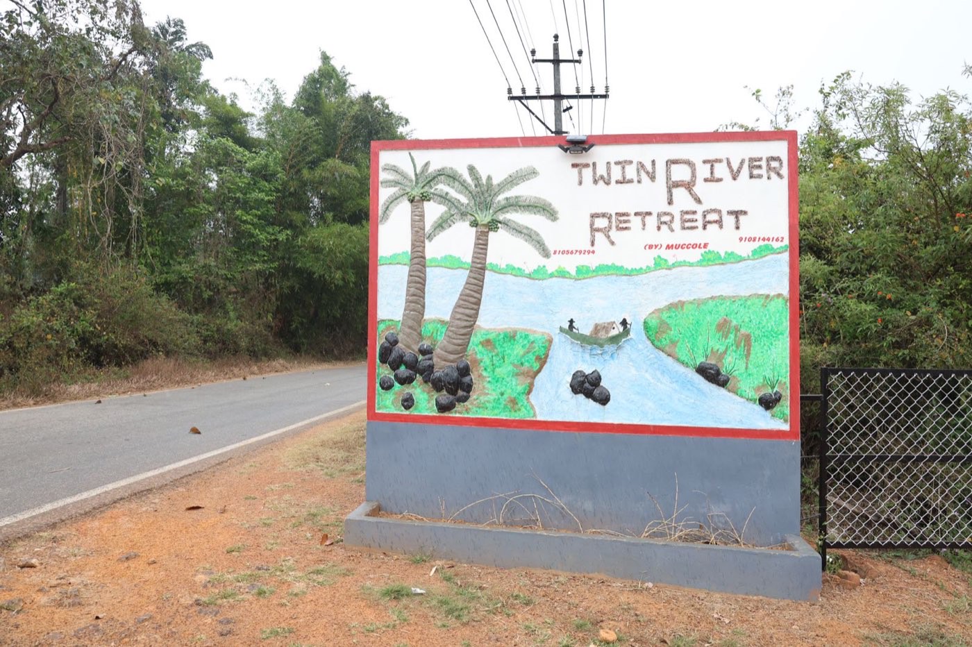 Hand-painted Twin River Retreat by Muccole signboard